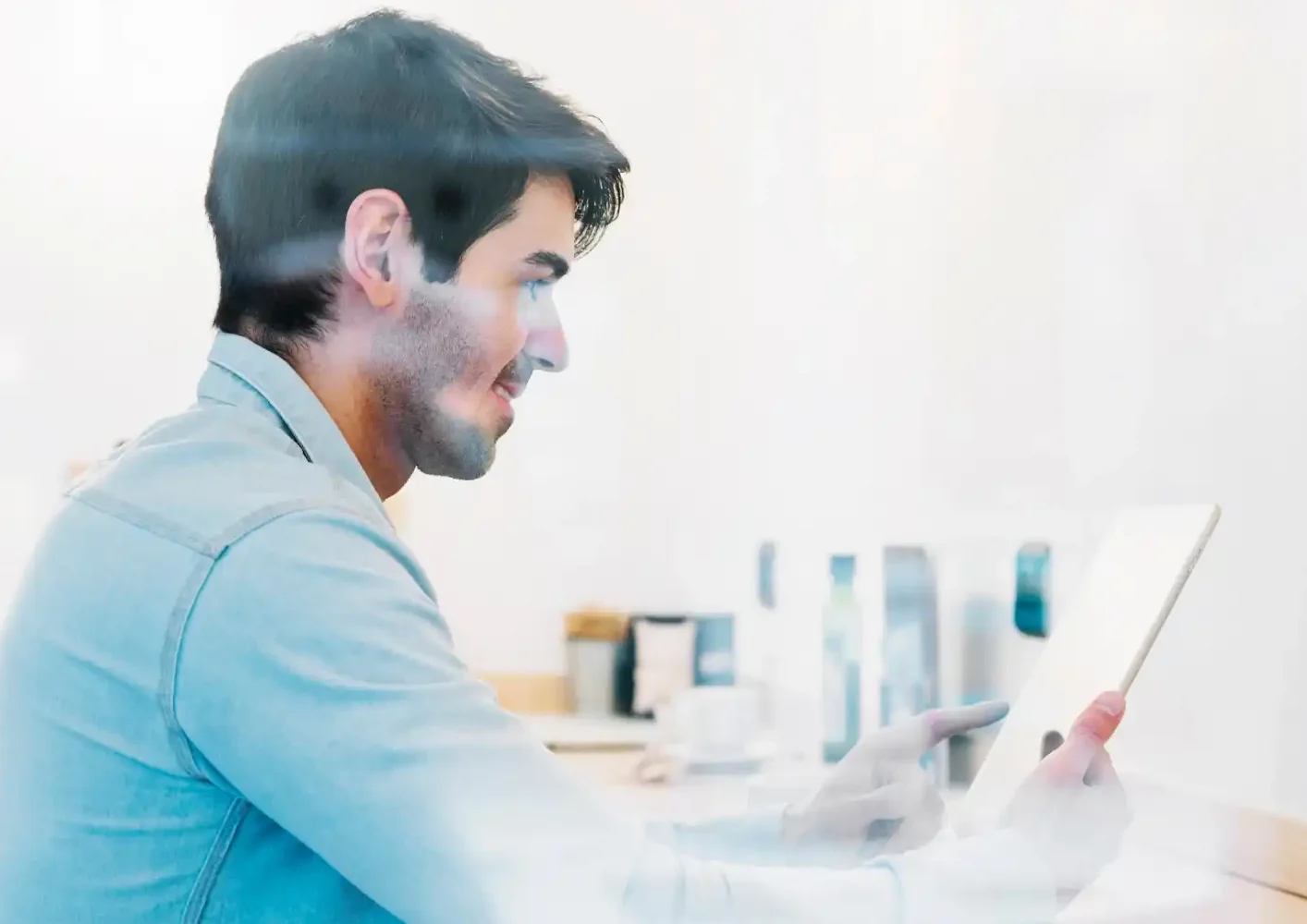 G&R Solutions IT consultant reviewing data on tablet for system monitoring and business technology management